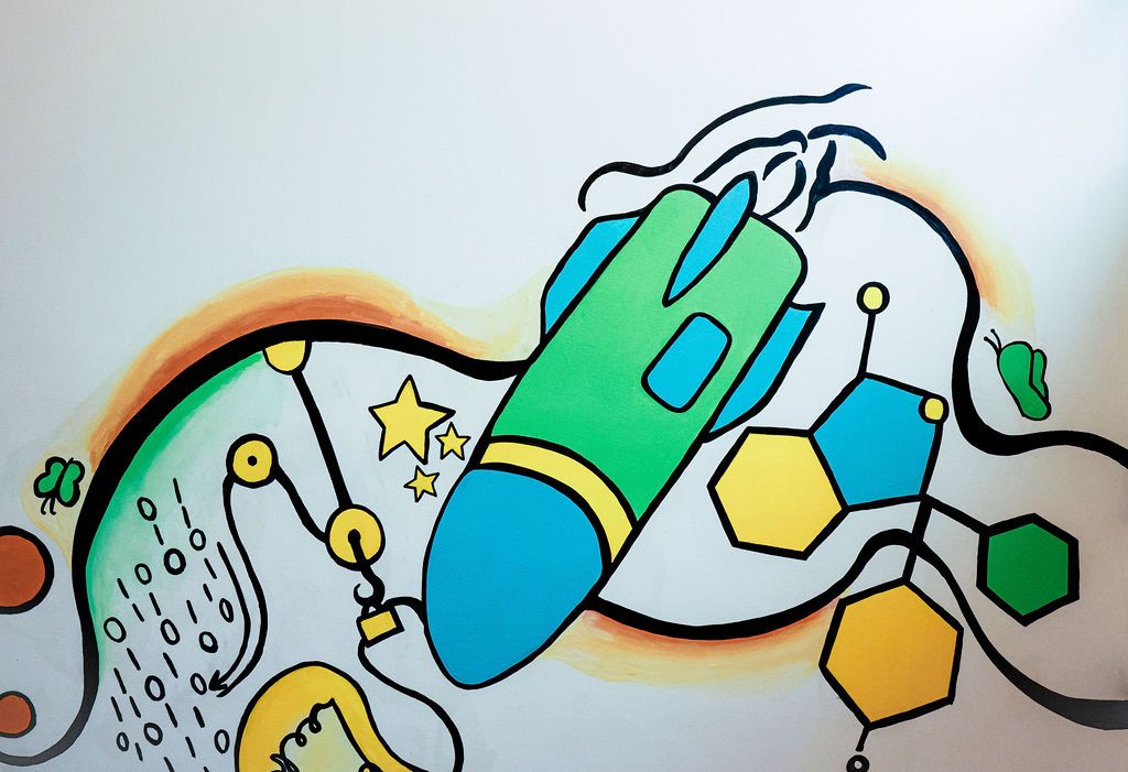 Detail: a blue and green rocket beside molecule hexagons